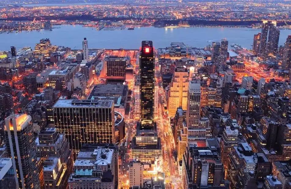 Bitcoin is the "Manhattan real estate" of the digital age; owning just one gives you elite status
